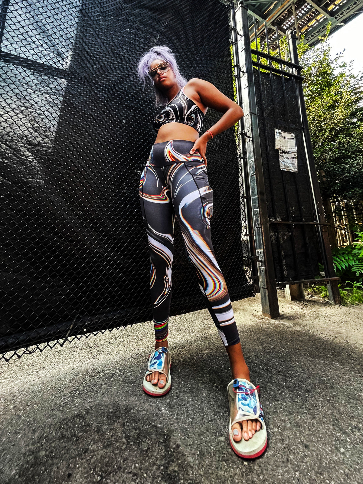 Pair of Drip Drop Labs Super Future low-waist leggings in black, showcasing a snug fit and sleek design for activewear.