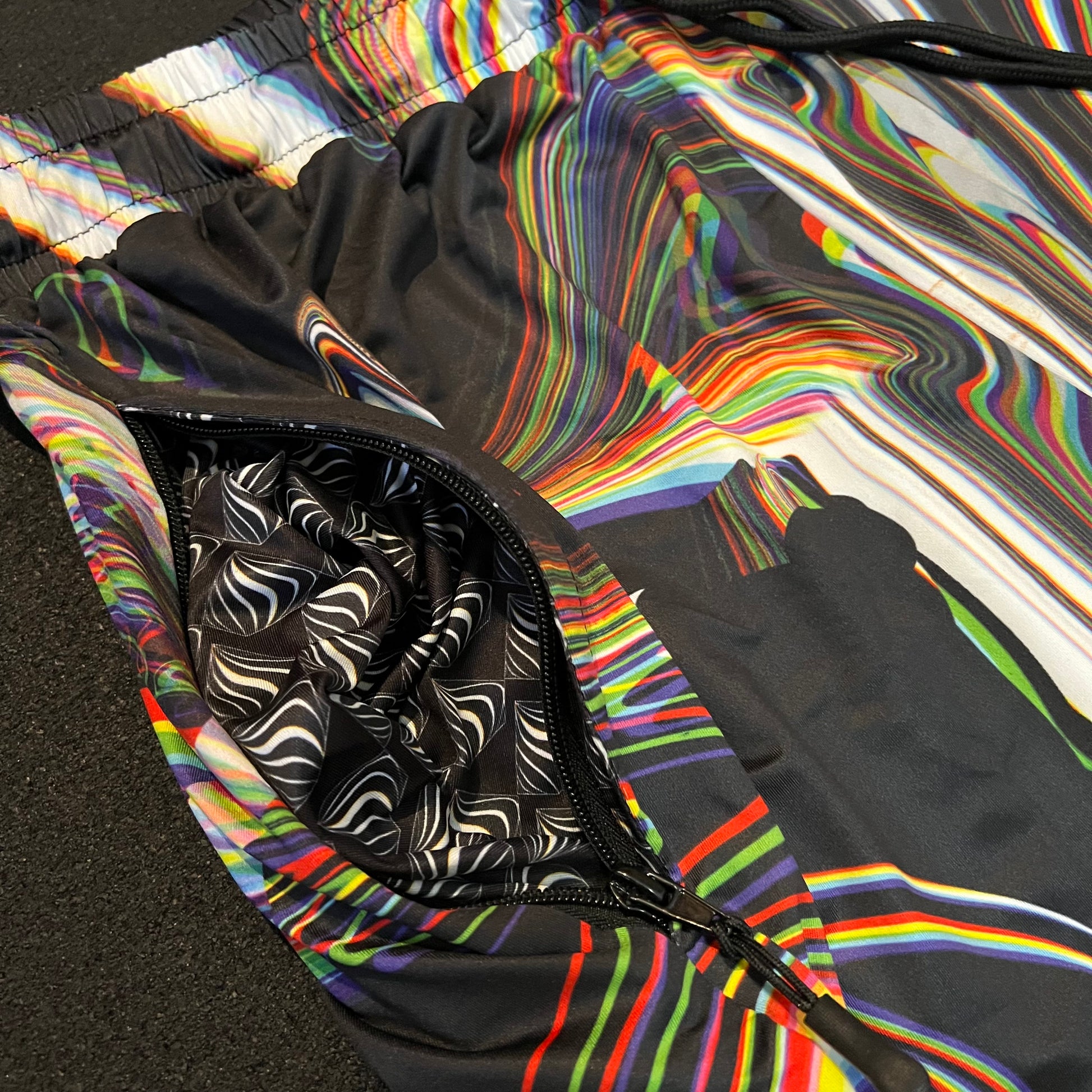Drip Drop Labs Super Future parachute pants featuring lightweight fabric, adjustable drawstrings, and a relaxed fit.