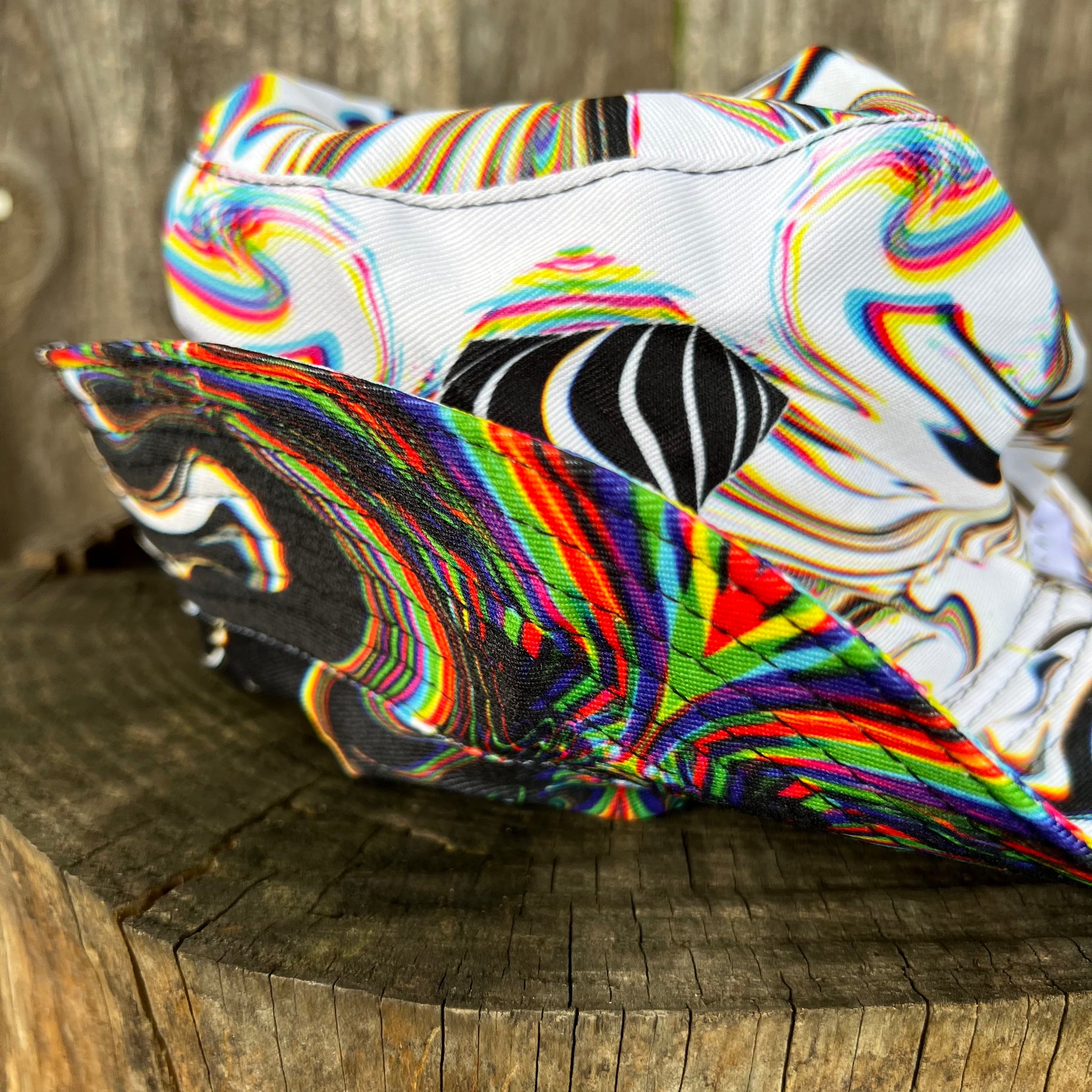 Reversible bucket hat by Drip Drop Labs, featuring a stylish design and versatile wear in a close-up shot.