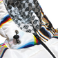 White winter coat by Drip Drop Labs from the Super Future collection, shown hanging with a hood and front zipper.
