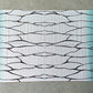 Soft, luxurious Thunderfly Pashmina scarf by Drip Drop Labs featuring intricate patterns and rich fabric texture.