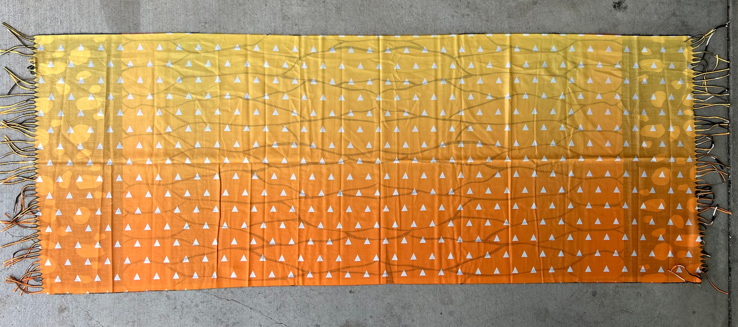 Drip Drop Labs Thunderfly Pashmina scarf featuring soft, lightweight fabric in vibrant colors, draped elegantly.