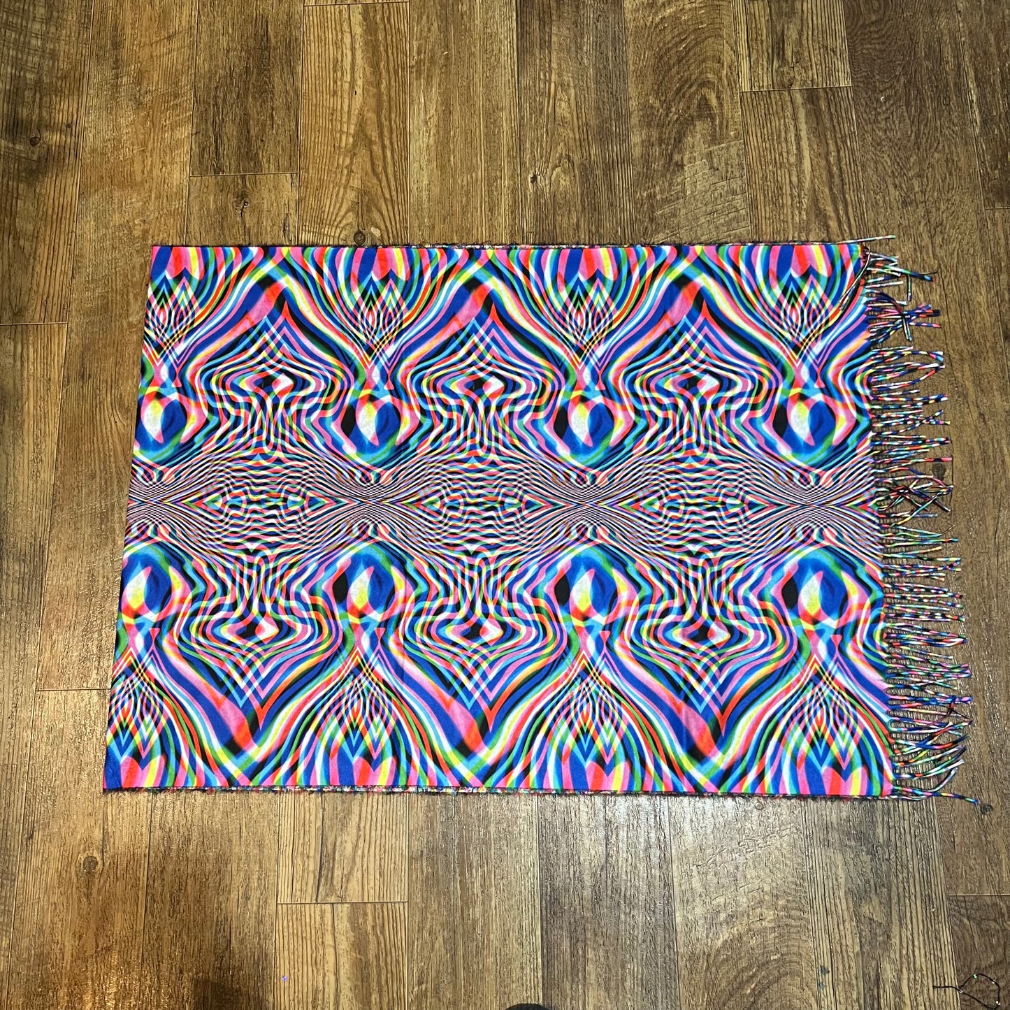 Drip Drop Labs Vibrationz Pashmina scarf with soft, luxurious fabric and vibrant multicolor patterns, styled for elegant wear.