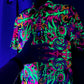 Wild Forest UV Polo by Drip Drop Labs featuring a forest-themed design, short sleeves, and breathable fabric for casual wear.